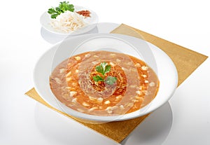 Shark fin soup with gold colour table mat