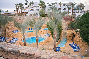 Sharm El Sheikh, Egypt - March 11, 2020: An empty complex of Spa pools Jacuzzi with many free sun loungers is available in open