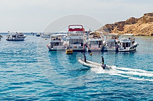 Sharm El Sheikh, Egypt May 08, 2019: Tourist pleasure boats in the harbor of Sharm El Sheikh