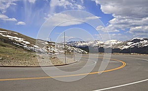 Sharp bend in mountain road photo