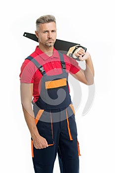 Sharp and dangerous. Builder worker carpenter handyman hold saw white background. Man serious face expression hold