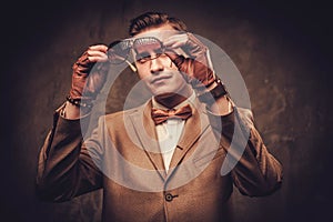 Sharp dressed man wearing jacket and bow tie