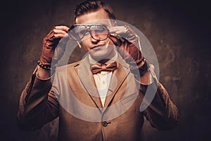 Sharp dressed man wearing jacket and bow tie