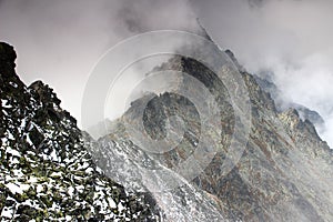 Sharp edge ridge in clouds, Slavkovsky peak, High Tatras