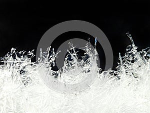 Sharp Ice sheet crystal edge over creek in frigid winter weather