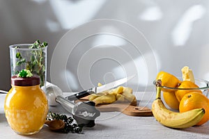 Sharp kitchen knife on peeled foods. Kitchen knife on the table with food