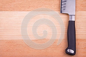 Sharp knife on cutting board