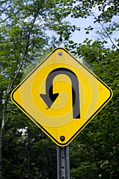 Sharp left turn sign photo