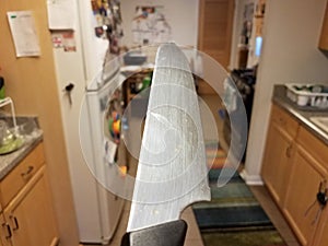 Sharp metal knife in kitchen first person perspective