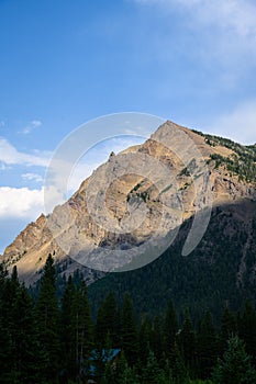 Sharp mountain peak on a sunny blue sky day, Cooke City, Montana, USA