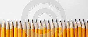 Sharp pencils on background, top view with space for text. Banner design