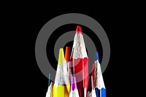 Sharp red pencil in focus, conceptual leadership image