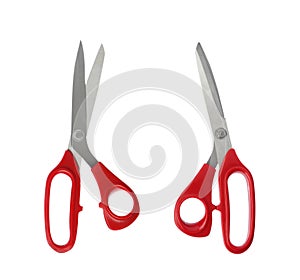 Sharp sewing scissors on background, top view