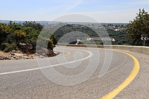 Sharp turn and climb and descent on a mountain road