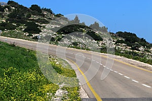 Sharp turn and climb and descent on a mountain road