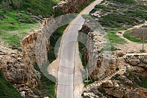 Sharp turn and climb and descent on a mountain road