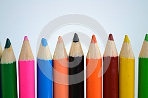Sharped colored pencils on white background for art drawing