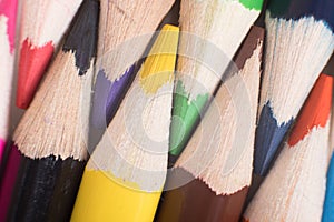 Sharpened colored pencils interleaved together