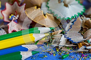 Sharpened colored pencils and pencil shavings