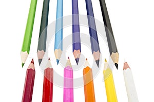 Sharpened colored pencils on the white background.