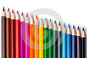 Sharpened colored pencils on a white background.