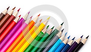 Sharpened colored pencils on a white background.