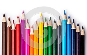 Sharpened colored pencils on a white background.