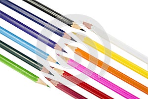 Sharpened colored pencils on the white background.