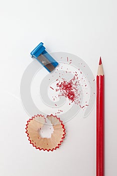 Sharpened pencil, shavings and sharpener