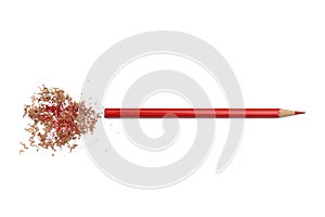 Sharpened red pencil with sawdust