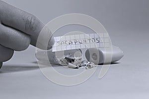 Sharpener with piece of paper saying Sacapuntas in Spanish photo