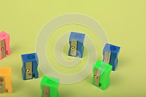 Sharpeners on green background