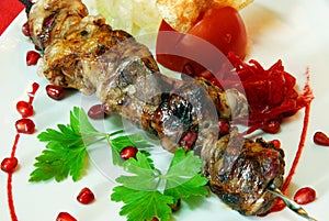 Shashlik on plate photo