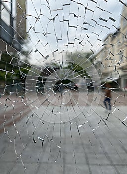 Shatterd window: vandalism in a  town