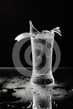 Shattered beer glass isolated on the dark background