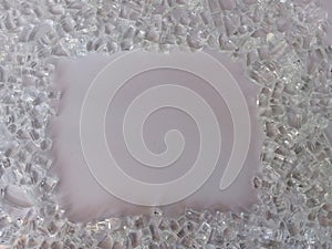 Shattered glass shards border on a white background