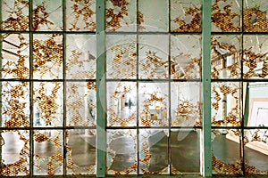 Shattered glass windows in an artist workshop