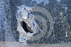 Shattered old broken and sharp glass - abstract background