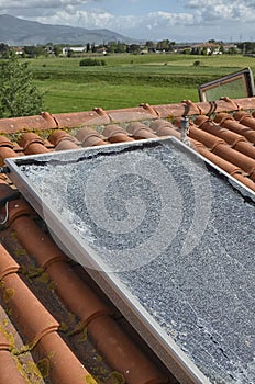 Shattered photovoltaic panel after a hailstorm
