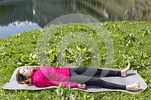 Shavasana outdoor in nature photo