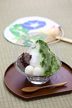 Shaved ice with matcha green tea syrup and azuki red beans jam