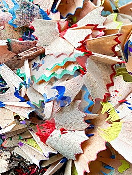 shavings and pieces of lead on paper after sharpening pencils, preparing pencils for use in teaching and drawing