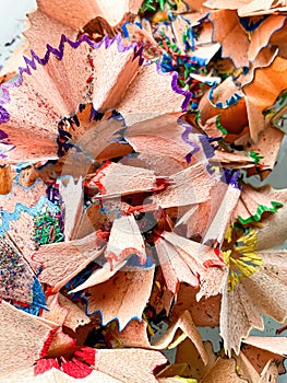 shavings and pieces of lead on paper after sharpening pencils, preparing pencils for use in teaching and drawing