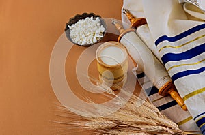 Shavuot is a traditional religious Jewish holiday on torah scroll and tallis