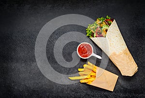 Shawarma with French Fries and Ketchup on Copy Space photo
