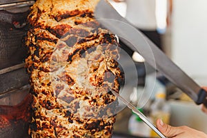 Shawarma meat being cut