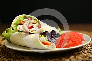 Shawarma, roll with chicken, salad in pita bread