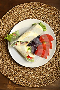 Shawarma, roll with chicken, salad in pita bread