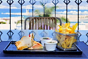 Shawarma sandwich with french fries and ketchup. Hotel food.