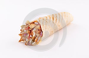 Shawarma wrap with onion and sauce on white background photo